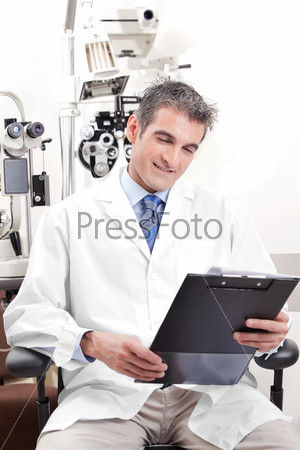 Portrait of doctor in ophthalmology clinic