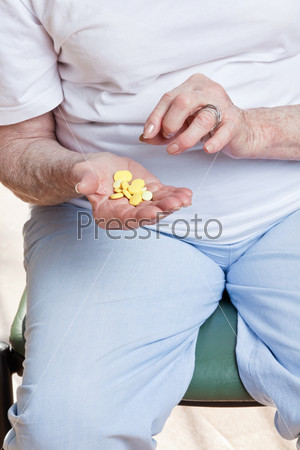 Sick Woman taking her Pills