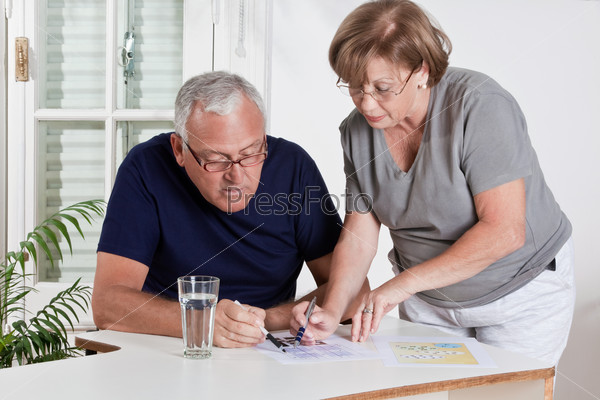Mature Couple playing Scrabble Game
