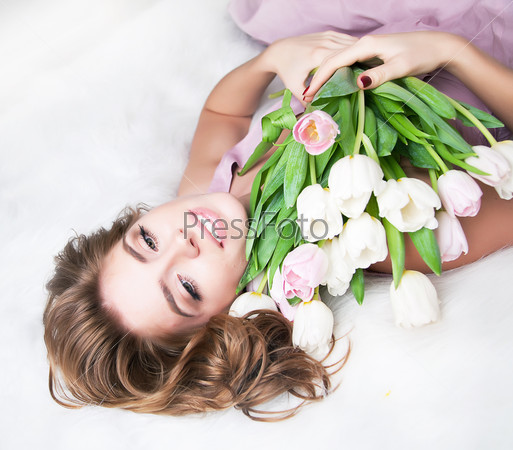 Valentine\'s Day - dreaming lovely young girl with bouquet of flowers. Series of photos