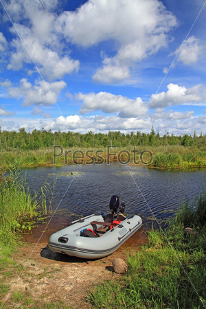 rubber boat on small river