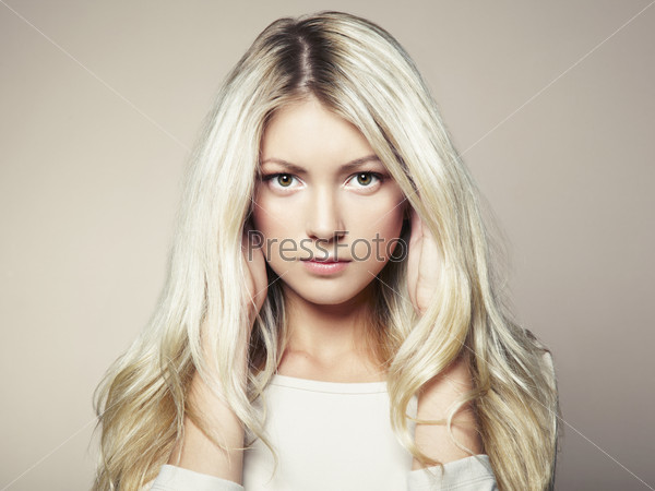 Photo of beautiful woman with magnificent hair. Fashion photo, stock photo