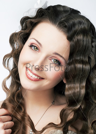 Pretty smile of young fresh woman beauty makeup and hair
