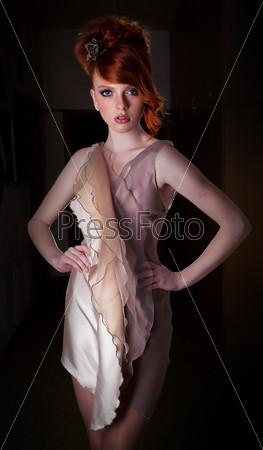 Red haired super model posing in fashion dress - series\
photos