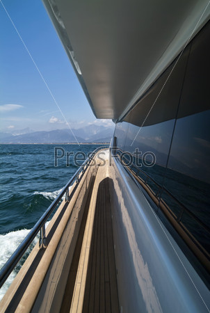 Italy, Tyrrhenian Sea, off the coast of Viareggio (Tuscany), Tecnomar 35 luxury yacht, sidewalk