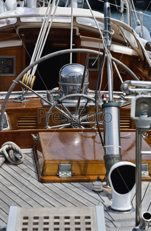 Italy, Tuscany, Viareggio port, the steering-wheel of an old wooden sailing boat