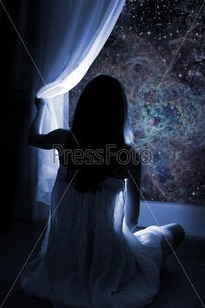 Young girl watching the stars