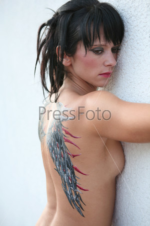 Sexy woman with wings body painting