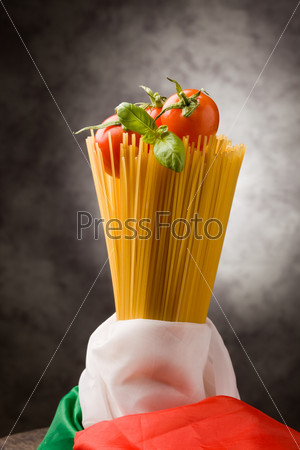 photo of italian spaghetties with italian flag wrapped arround