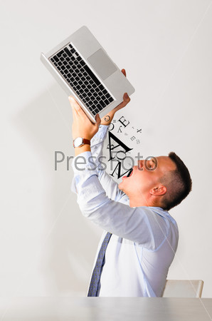 business man is consuming information from his laptop