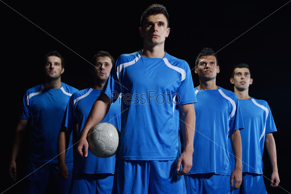 Soccer players team group isolated on black background, stock photo