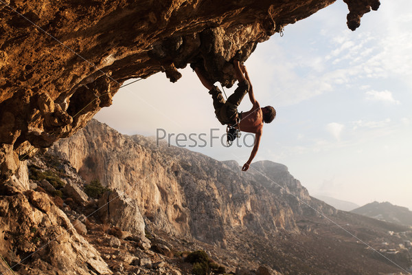 Rock climber at sunset, Kalymnos Island, Greece (climbing,\
rock)