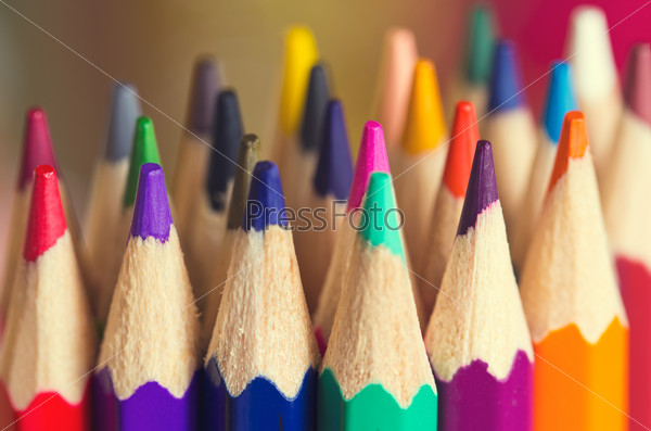 Macro background of the pencil as an element for design. Colored pencils closeup