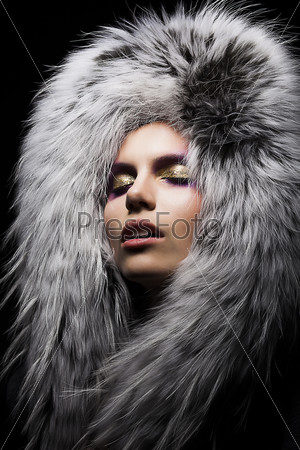 Beautiful young sensual Woman in Fur Fashion Collar. Winter style. Arctic Fox