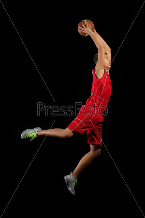 Basketball player with a ball
