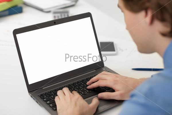 businessman working on his laptop with copy space on a screen