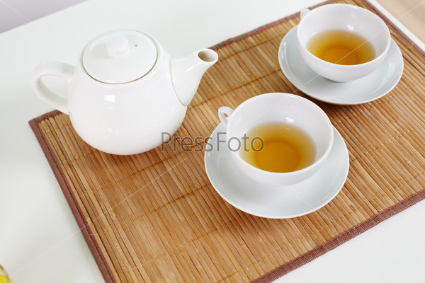 The above view of a tea set with healthful herbal drink, stock photo