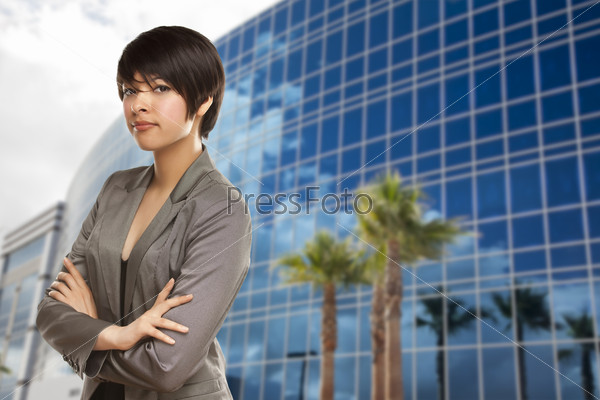 Attractive Mixed Race Young Adult in Front of Corporate Building.