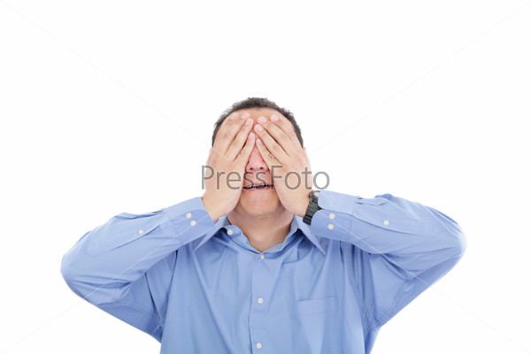 Portrait of a young business man depressed from work against white background