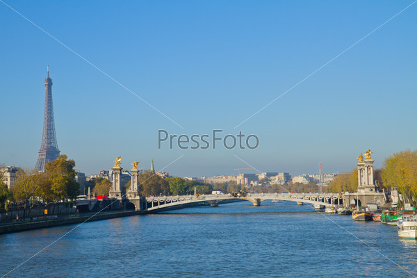 Alexandre III Bridge and Eiffel tower at sunny day,  Paris, France