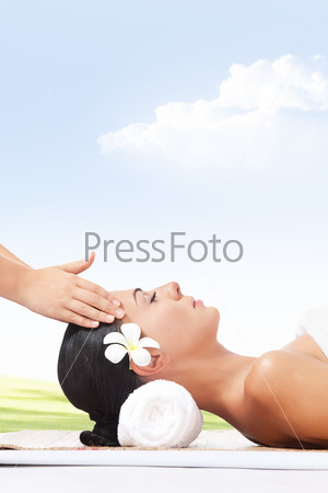 Portrait of young beautiful woman on color back, stock photo