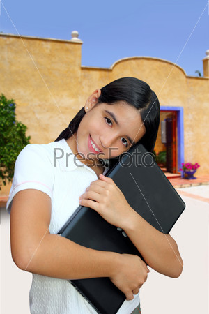 latin teenager brunette student hug laptop