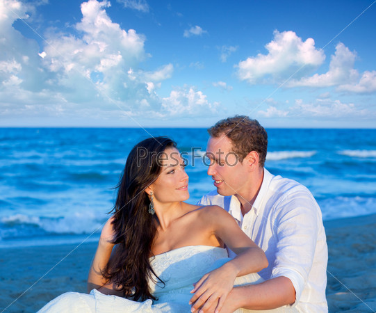 couple in love sitting in blue beach on vacation travel [ photo-illustration]