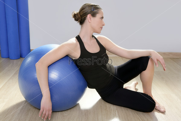 aerobics fitness woman relax pilates stability blue ball in sport gym