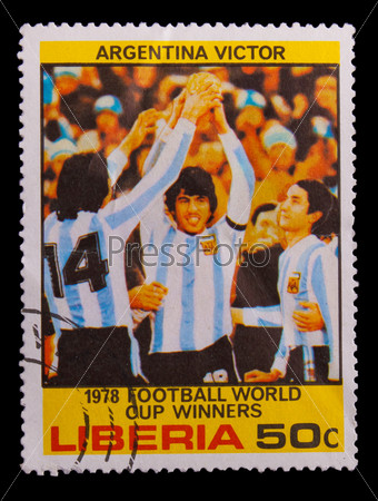 LIBERIA - CIRCA 1978: A post stamp printed LIBERIA, Argentina winner of World Cup 1978 soccer cup held Trophy Coupe du Monde, circa 1978