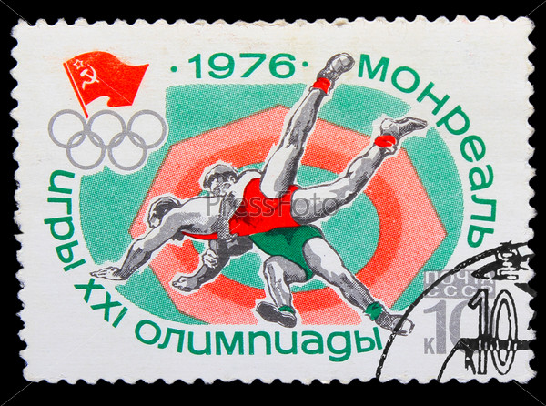 USSR - CIRCA 1976: A stamp printed in USSR, Summer Olympics in Montreal, wrestling, two wrestlers fighting in the ring, circa 1976