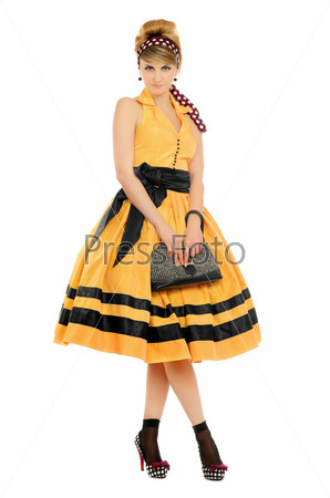 Cute young woman in yellow dress