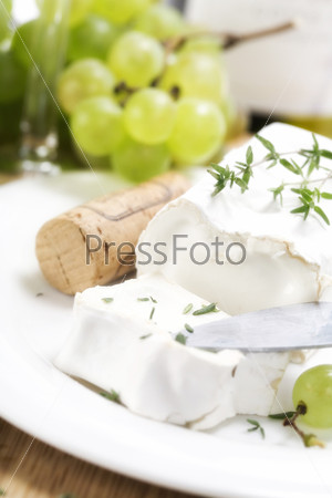 white soft goat cheese and grape
