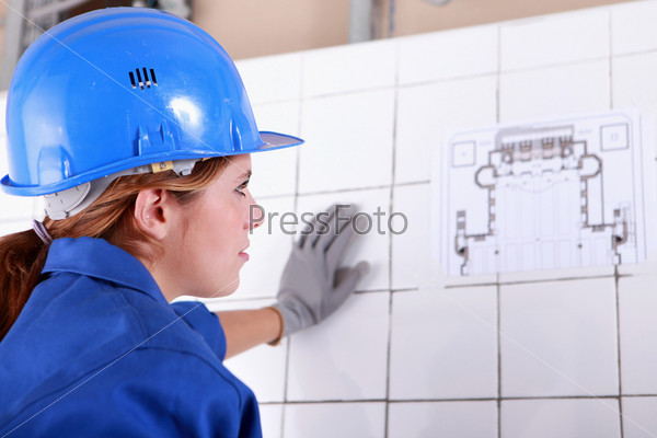 Woman foreman consulting plan