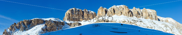 Beautiful winter mountain view  from Pordoi Pass with snow screen (pass in the Dolomites in the Alps)