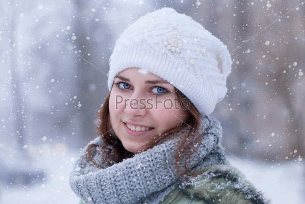 Portrait of beautiful woman in winter.