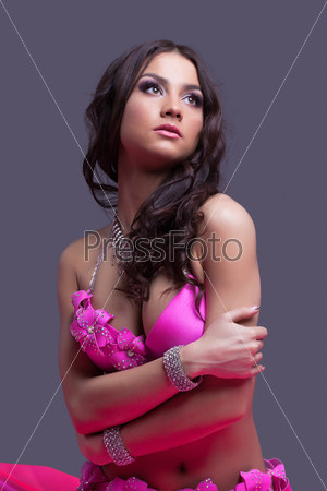 Beauty woman dancer portrait in pink costume
