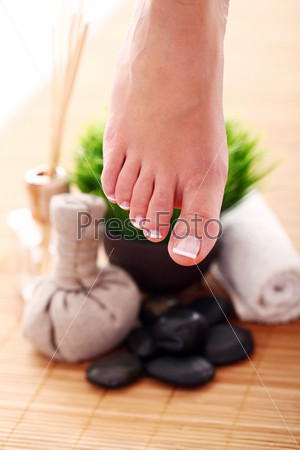 Image of SPA pedicure on bamboo surface