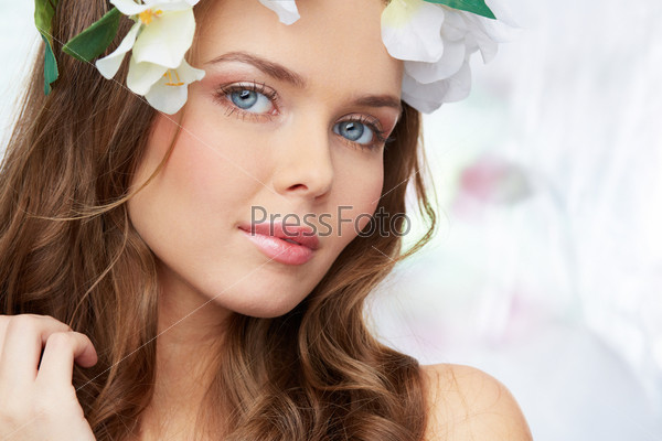 Peaceful portrait of a charming young lady waiting for spring