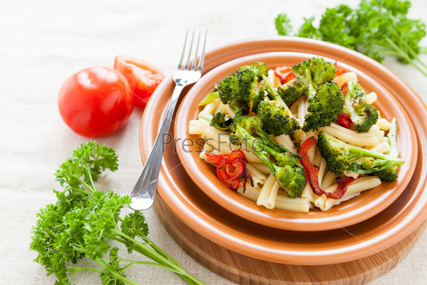 Nutritious Pasta with roasted vegetables broccoli and pepper. Italian food