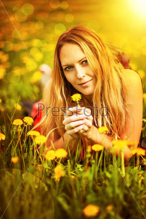 beauty woman liying on grass