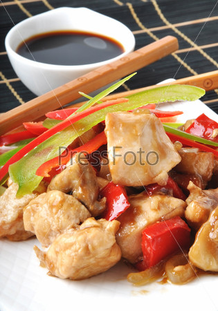 Stir fry chicken with sweet peppers and mushrooms