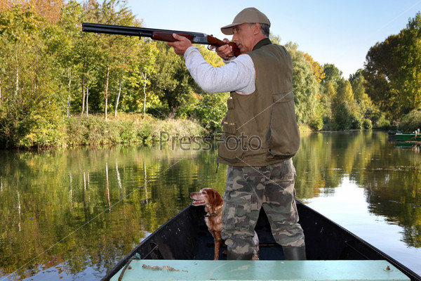 hunter in boat