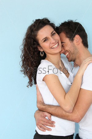 Cheerful couple hugging