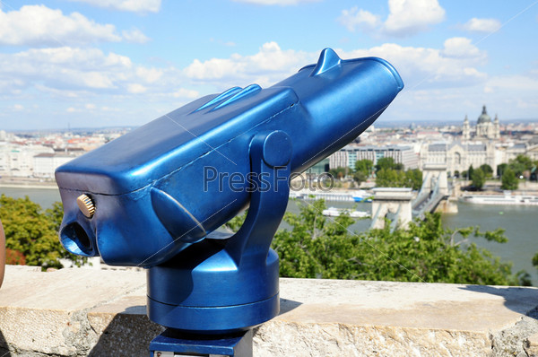 An image of a blue telescope outdoors