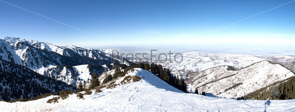 Panorama of Snowy winter in mountain forest. Amazing place for activity extreme sport and climbing in Almaty, Kazakhstan, Asia