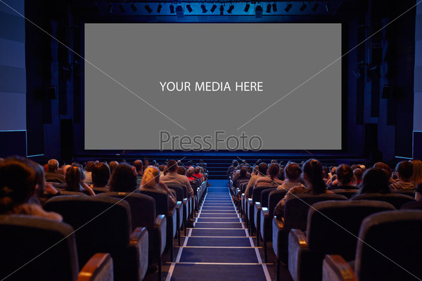 Empty cinema screen with audience. Ready for adding your picture. Screen has crisp borders. This shot was made using tripod with long exposure, stock photo