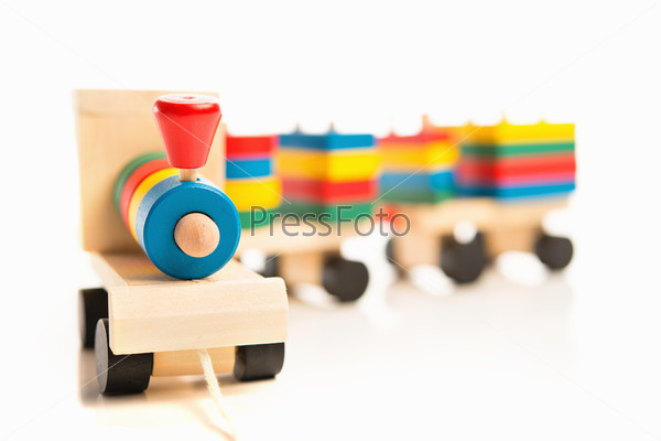 Wooden educational toys. colorful train isolated on white background, stock photo