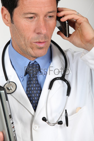 Doctor speaking on his phone