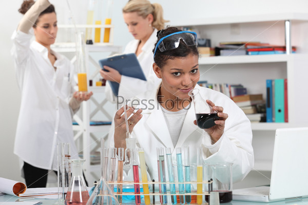 Women conducting science experiment