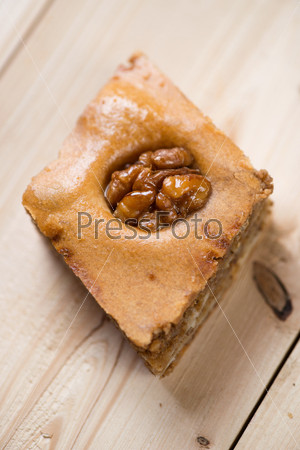 Still life food: baklava with walnuts and honey, view from above